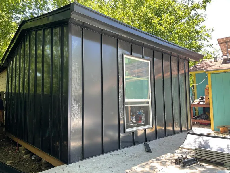 Black standing seam metal wall panels for Roof Inspection in Murphysboro