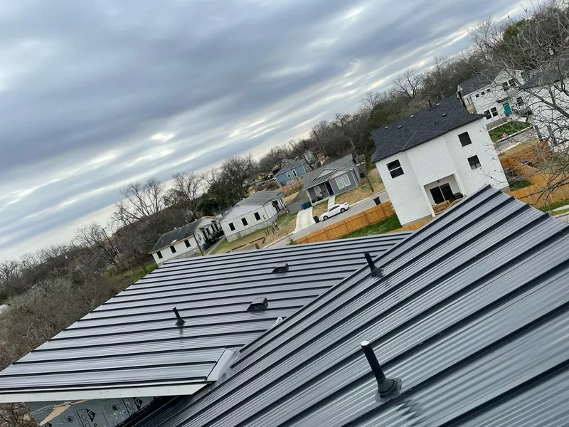 Standing seam metal roof panels with vents for Skylight Repair in Murphysboro
